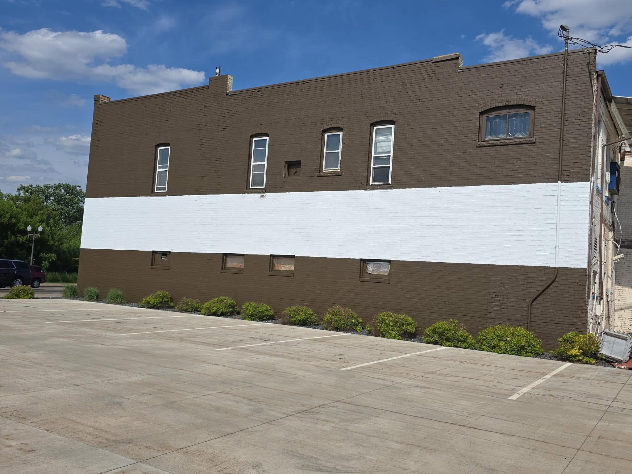 Building prepped with white area ready for a mural