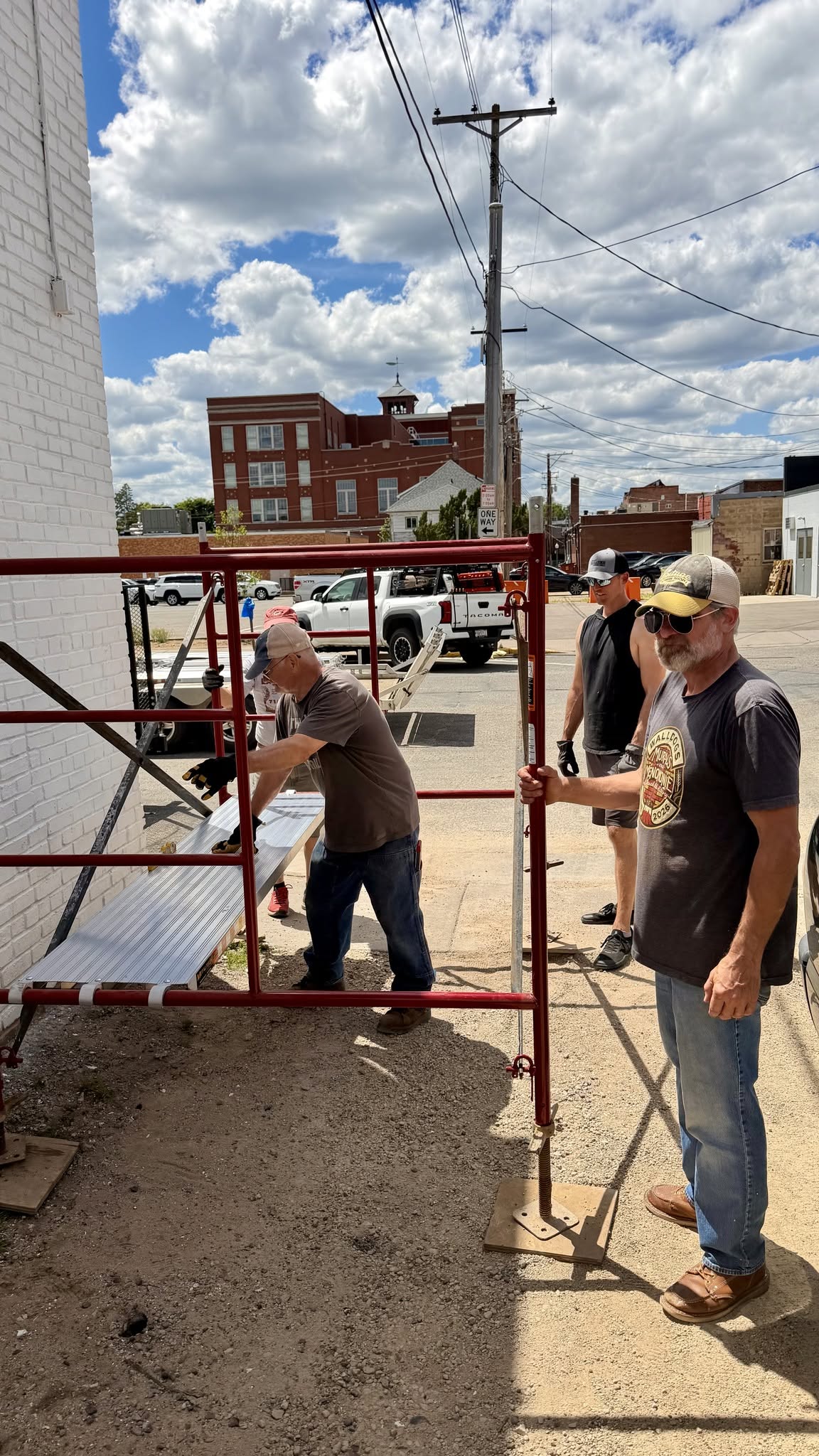 People working on scaffolding