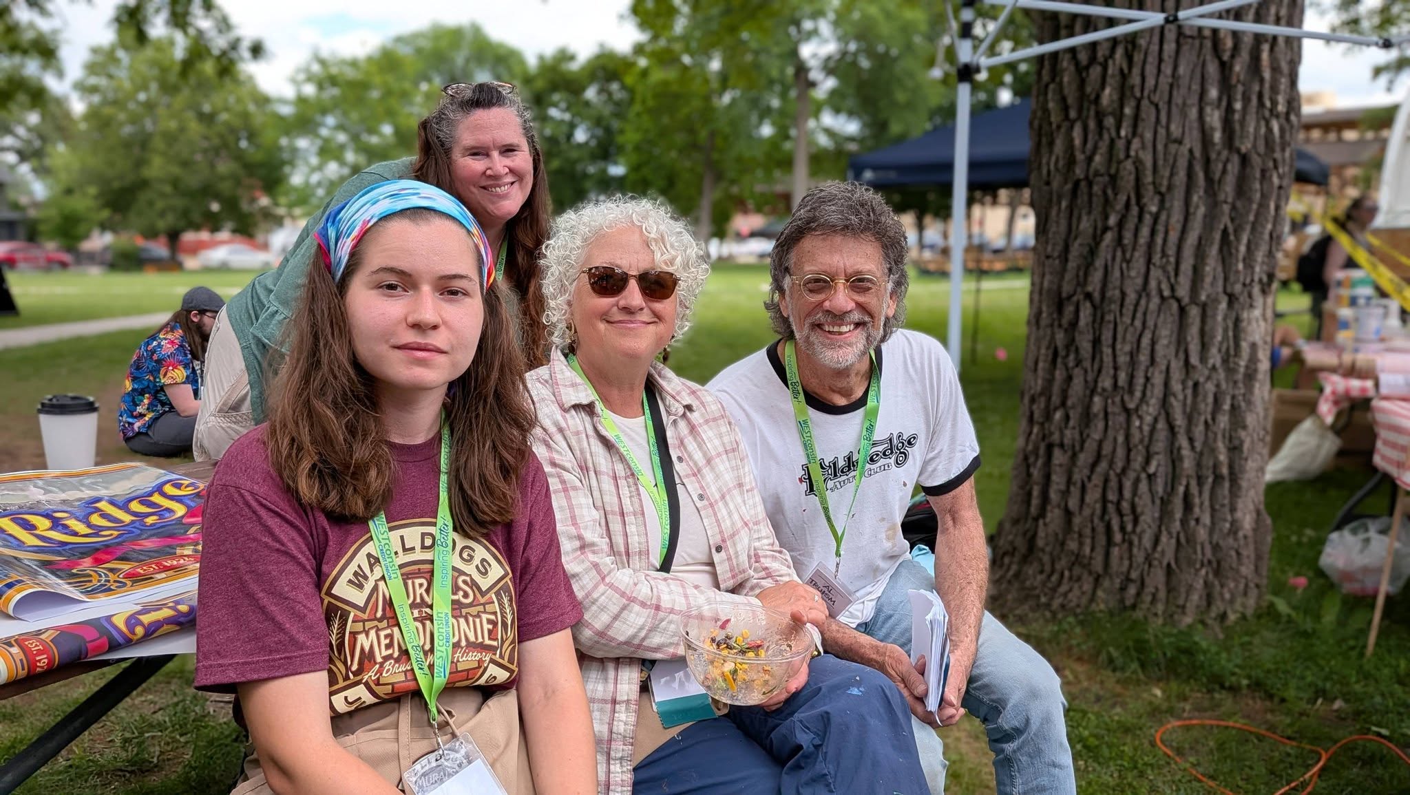 Group of artists and volunteers sitting together