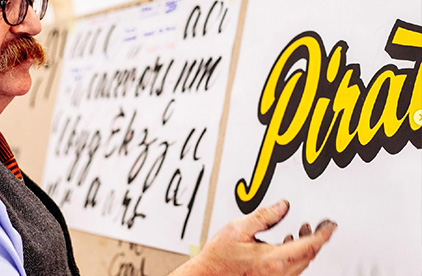 Man showing letters