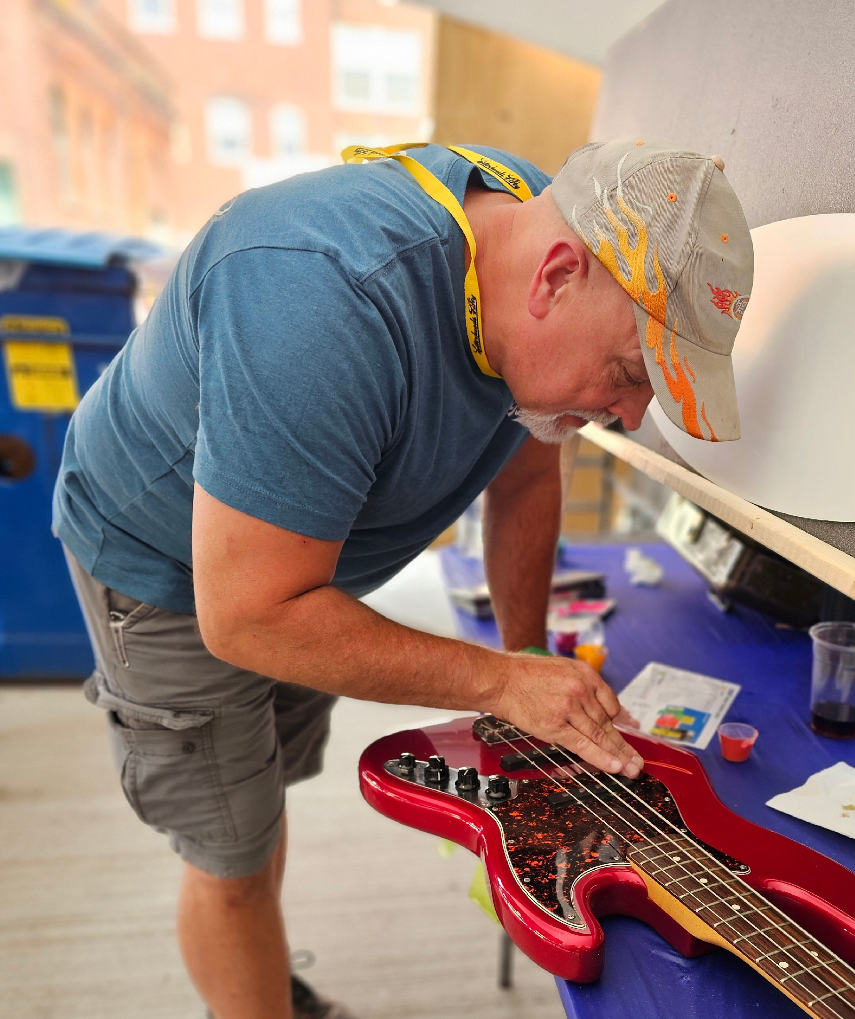 Man painting on a guitar